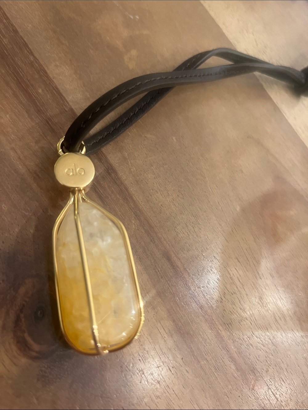 ALO Yoga Gold-Tone Yellow intuition Crystal Pendant on brown Cord